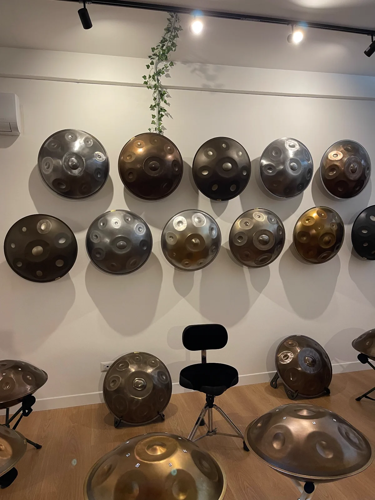 Handpans on the wall of the Battiloro workshop in Rome